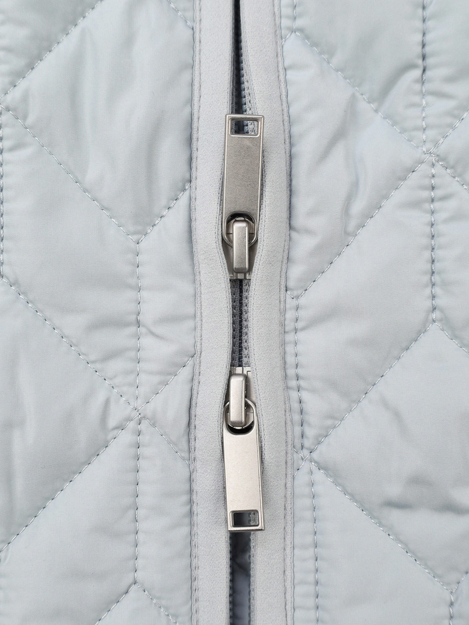 Пальто стеганое голубого цвета прямого кроя